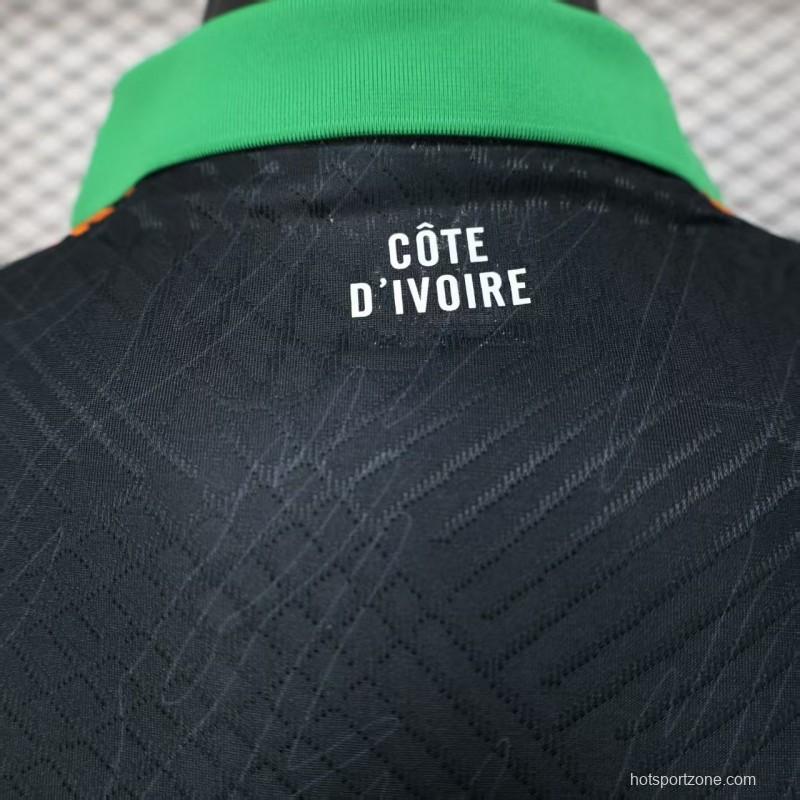 Player Version 2025 Ivory Coast Black with Elephant Graphic and Orange Stripes Jersey